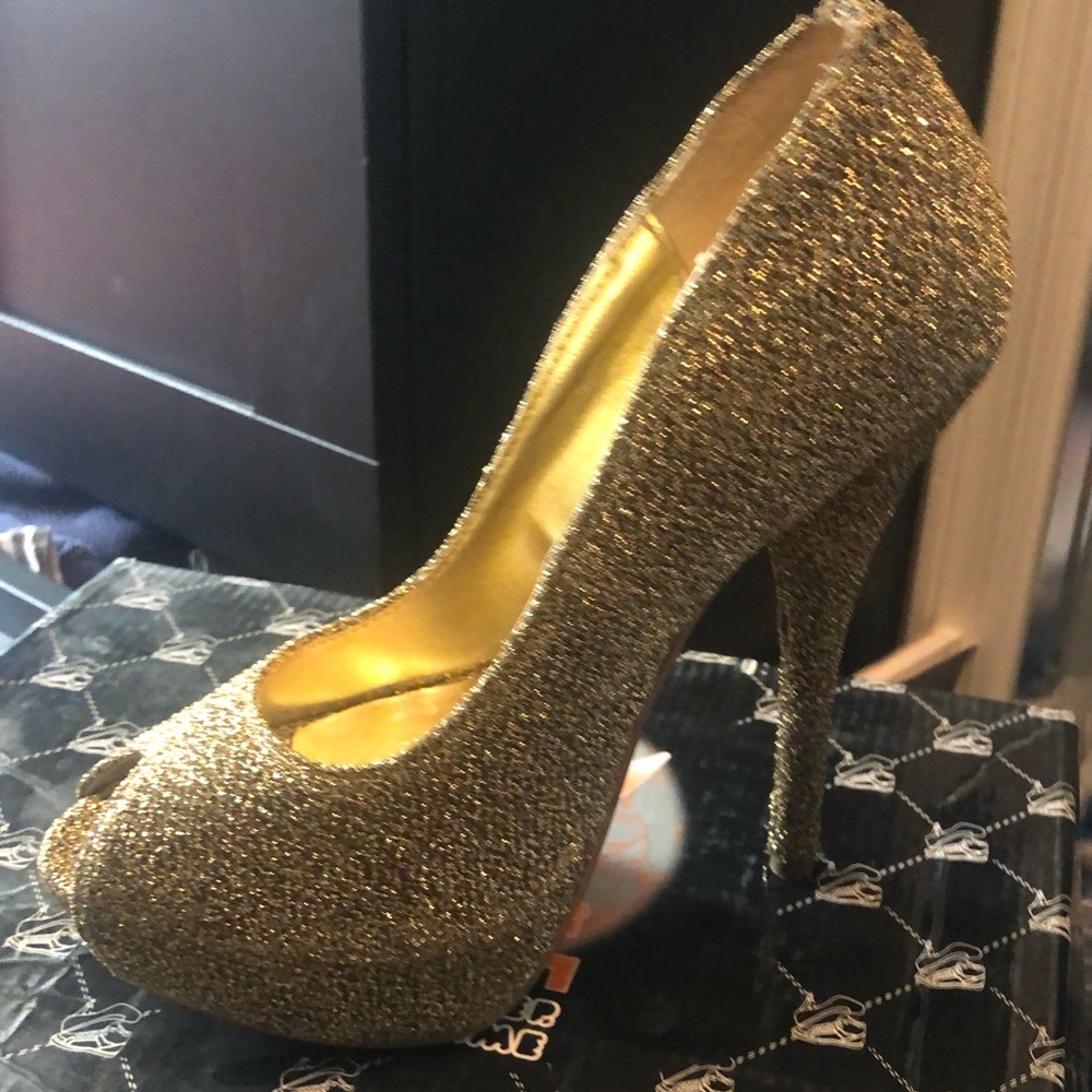 Gold and Black Platforms size 6 1/2